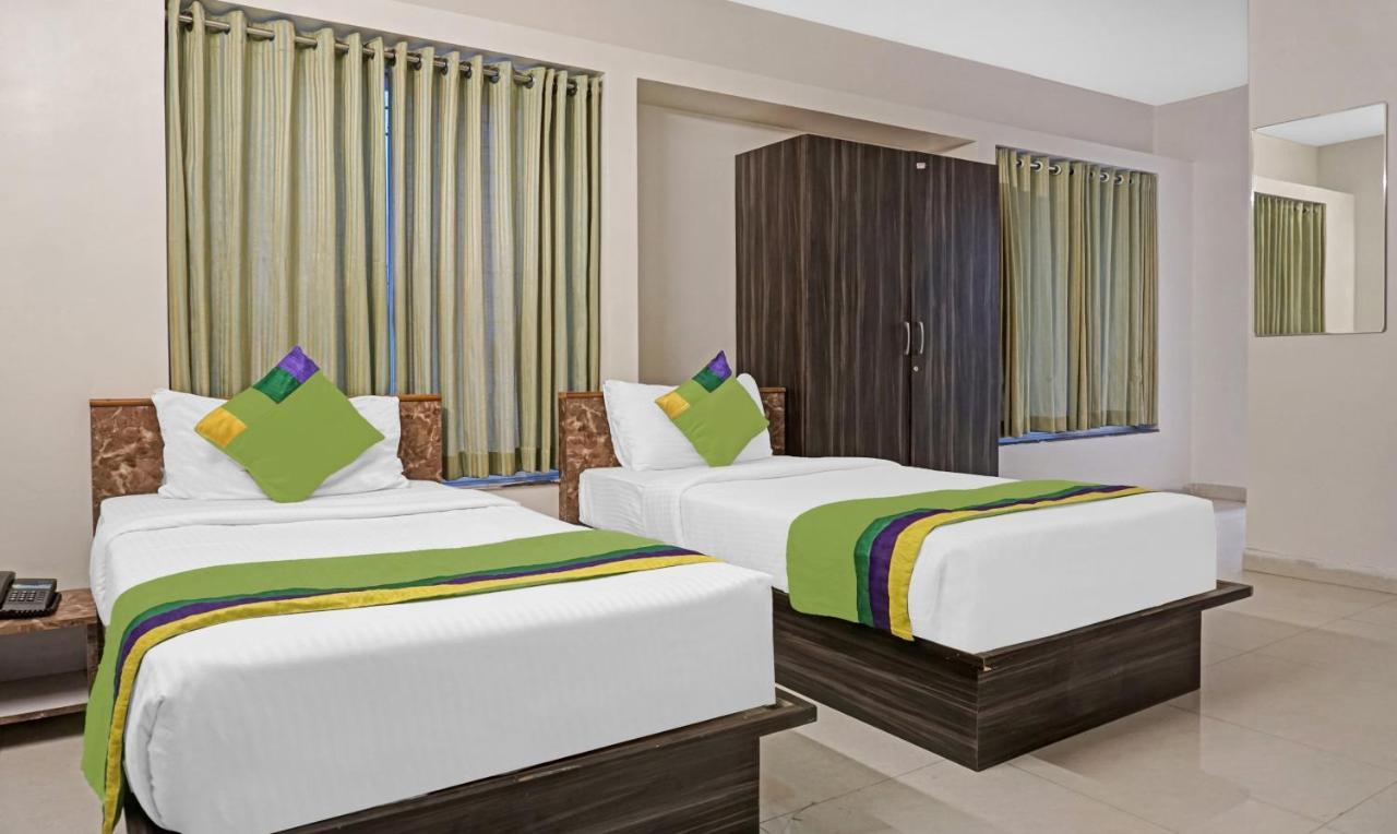 Treebo Diamond Residency - Ddpk Inn Пюн Екстериор снимка