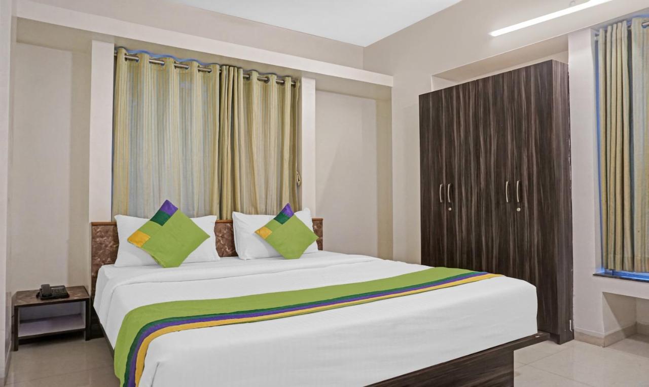 Treebo Diamond Residency - Ddpk Inn Пюн Екстериор снимка