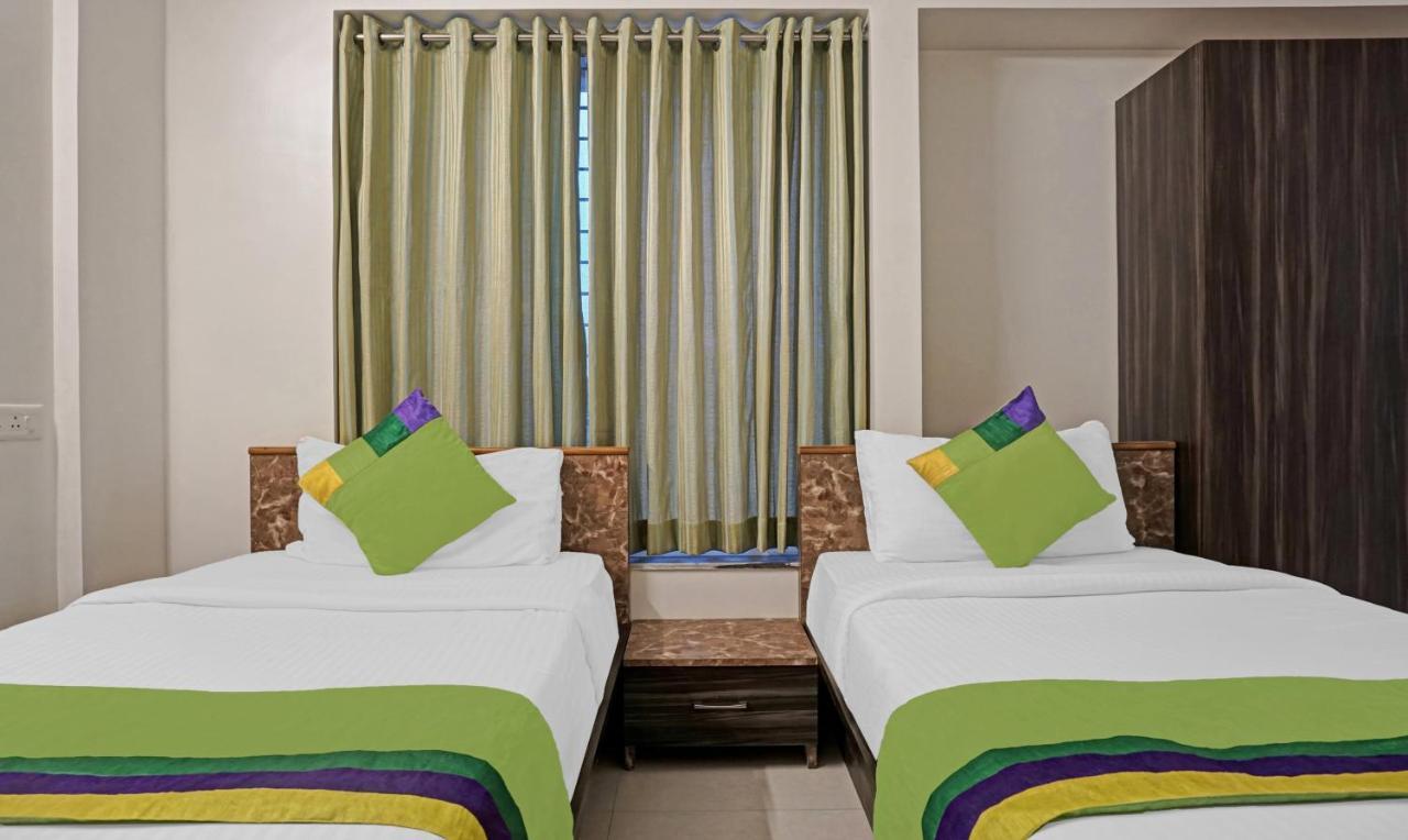 Treebo Diamond Residency - Ddpk Inn Пюн Екстериор снимка