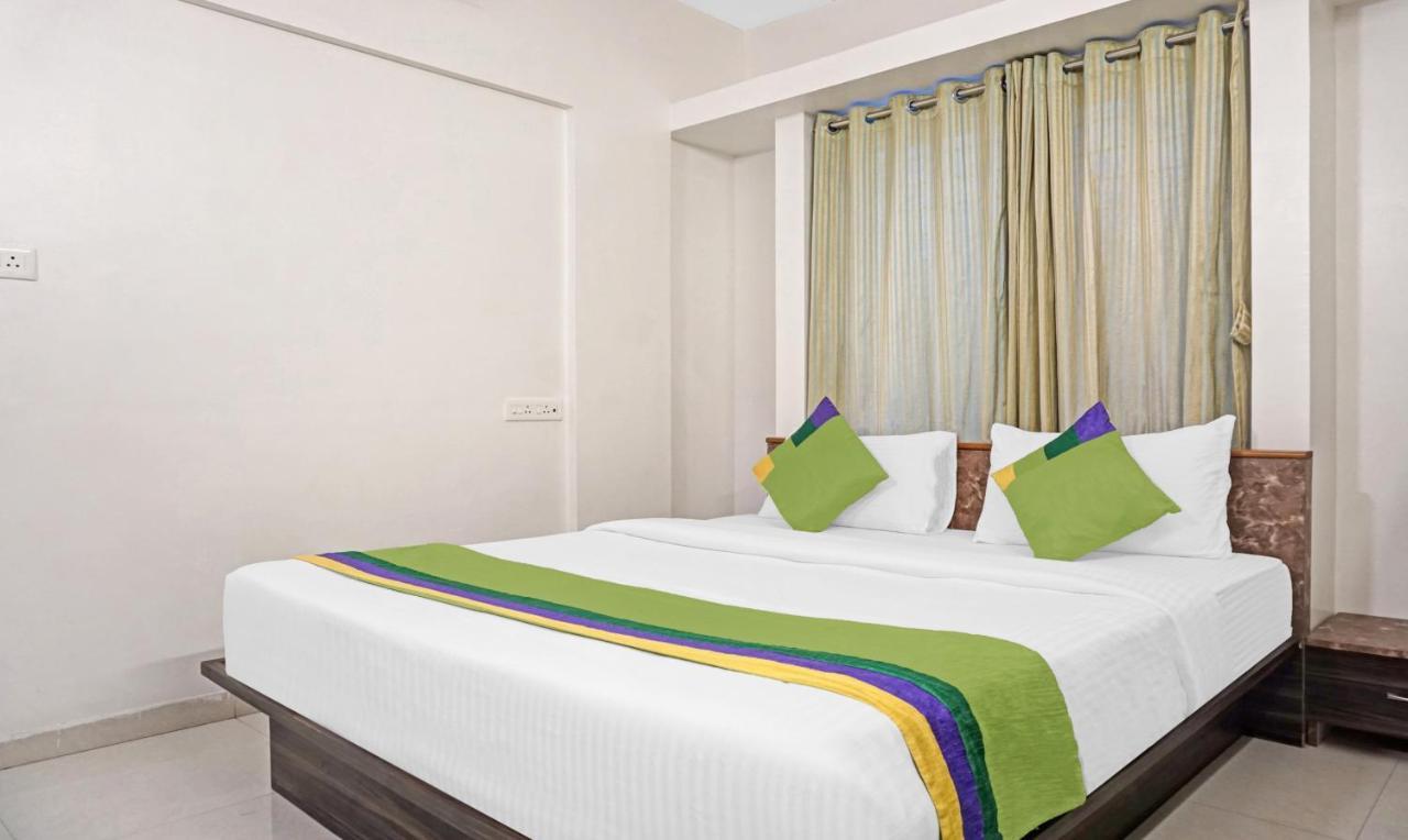 Treebo Diamond Residency - Ddpk Inn Пюн Екстериор снимка